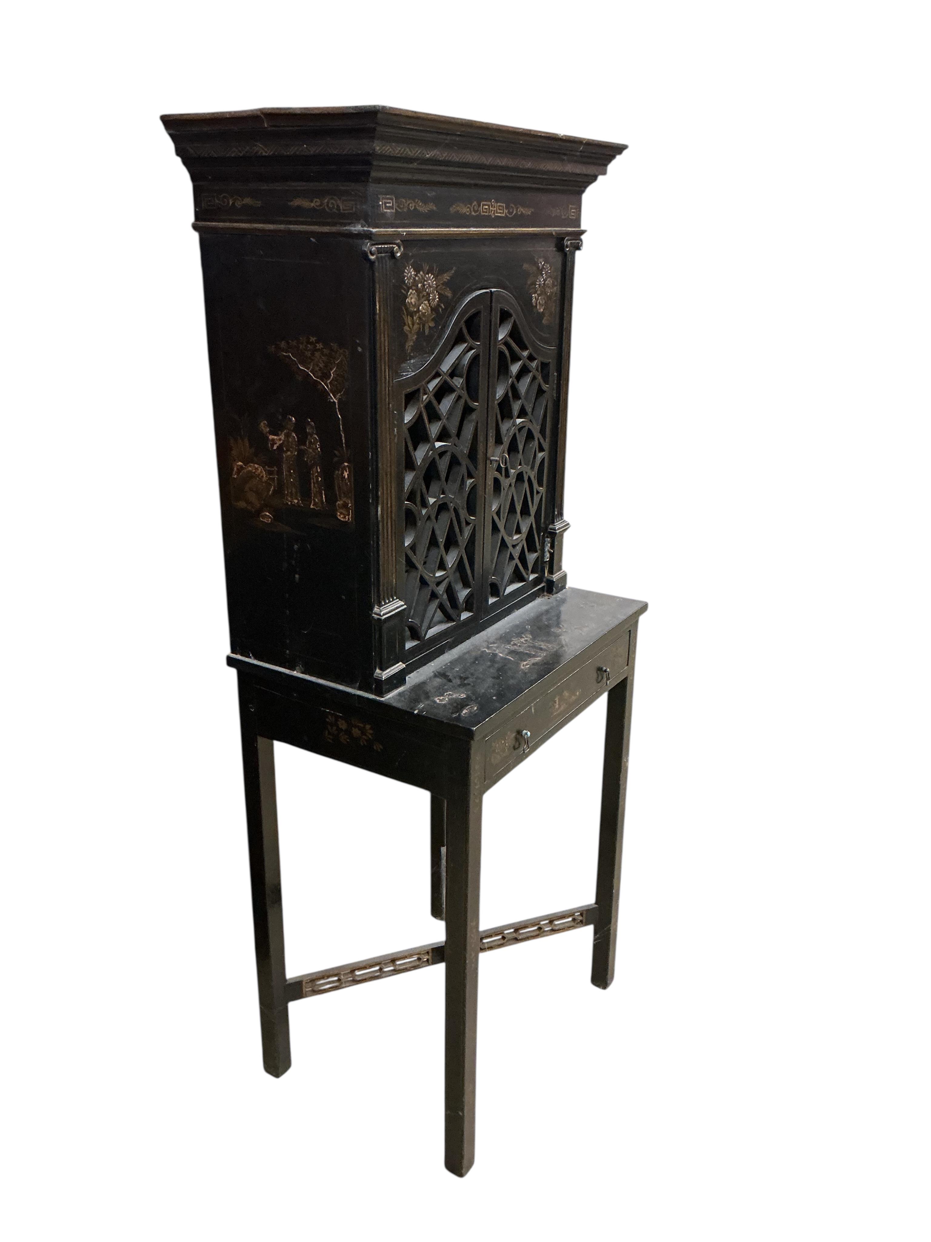 A chinoiserie lacquer cabinet on stand, width 63cm, depth 31cm, height 147cm